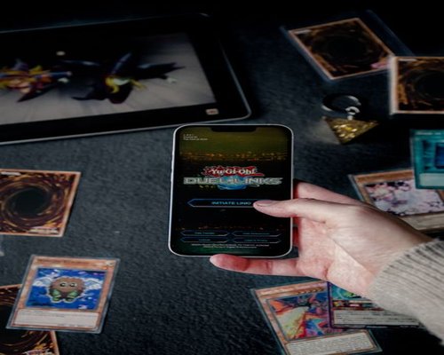 Mobile gaming demonstration shown on a central smartphone screen during a technology showcase